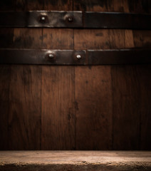 background of barrel and worn old table of wood
