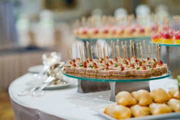 Glass shots pastry, wedding catering food, mini canapes food, tasty dessert, Beautiful decorate catering banquet table,  snacks and appetizers, wedding celebration