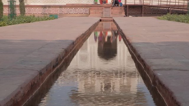 Reflection on water channel landscape of Tomb of I'timād-ud-Daulah (Itimad ud Daulah ka Maqbara) is a Mughal mausoleum in Agra or known as "jewel box" or "baby taj"