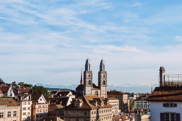 Fototapeta premium Old Grossmunster cathedral and medieval buildings in Zurich Old town Altstadt
