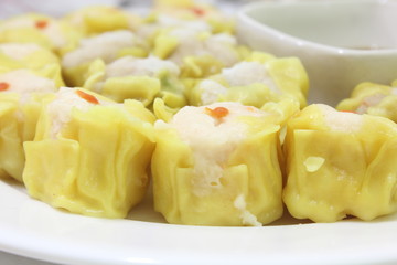 Closeup Dim Sum in white dish, select focus.