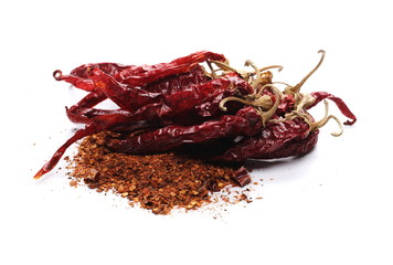 Dry spicy chili peppers and flakes, powder isolated on white background