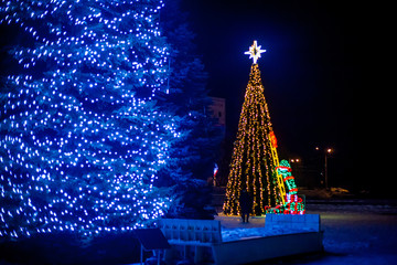 christmas tree with colorful lights and stars