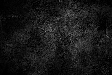 Abstract background from black concrete texture with grunge and scratched in dark tone. Retro and vintage. Picture for add text message. Backdrop for design art work.