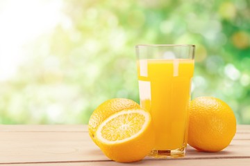 Orange juice and slices of orange on background © BillionPhotos.com