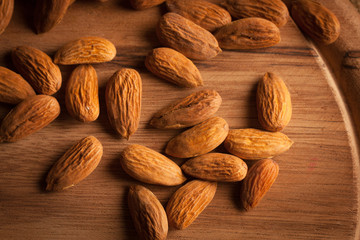 mix of nuts on a wooden table