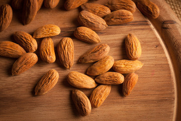 mix of nuts on a wooden table