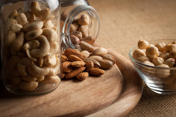 mix of nuts on a wooden table