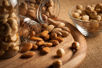 mix of nuts on a wooden table