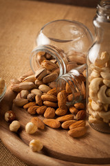 mix of nuts on a wooden table
