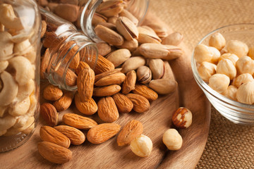 mix of nuts on a wooden table