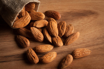 mix of nuts on a wooden table