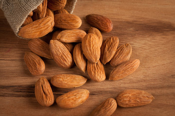mix of nuts on a wooden table