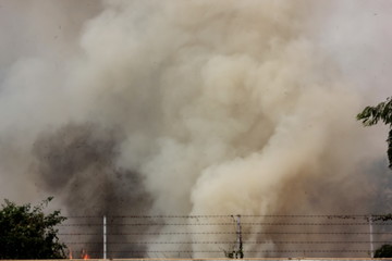 air pollution fron burning  grass