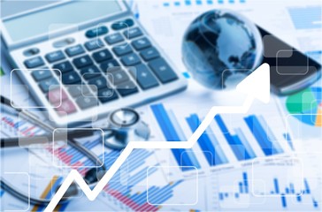 Fototapeta premium Health care costs. Stethoscope and calculator symbol for health