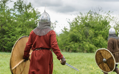 Medieval knight with sword and shield