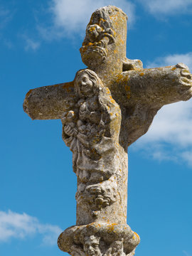 Catholic stone cross in Viana Do Alentejo, Evora, Portugal.