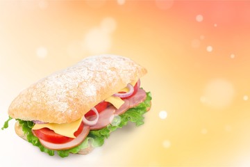 Footlong ham & swiss submarine sandwich isolated on white