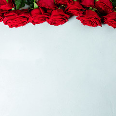 Beautiful red roses, flay lay, space for text