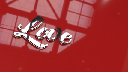 The metallic love text on glossy, red background. Love concept for valentines day with a sweet and romantic moment.