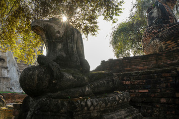 Fototapeta na wymiar Old Buddha statue no head at