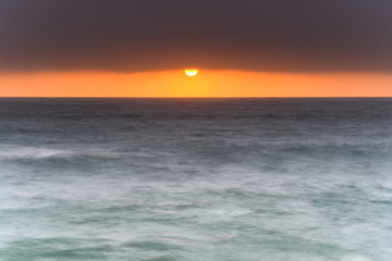 Sun and Sea with Heavy Cloud