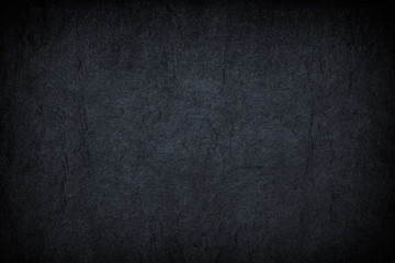 Dark grey black slate background or texture.