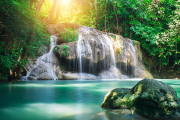 Beauty in nature, amazing Erawan waterfall in tropical forest of national park, Thailand  