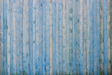 Fototapeta na wymiar Old blue fence