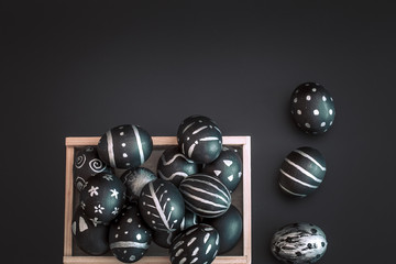 Easter composition with eggs in a wooden box