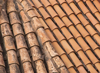 Old tile roof.Terracota background. Exterior pattern.