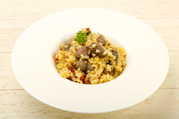 Bulgur with chicken hearts