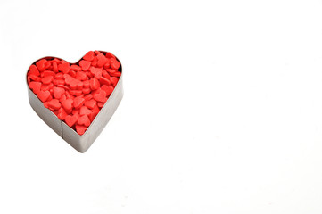 Sweet hearts. Red candy heart isolated on white background.
