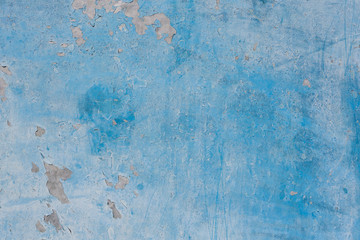 Blue painted old cement wall. Abstract grunge texture background