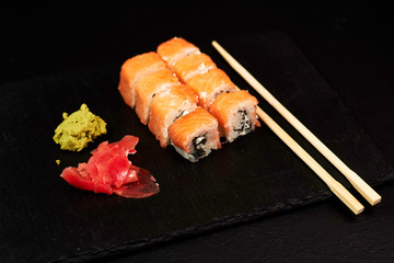 sushi with chopsticks isolated on white background