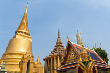 Fototapeta premium Photo of Golden pagoda and temple of Wat Phra Keaw, the emerald buddha, Bangkok.