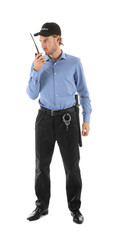 Male security guard with portable radio transmitter on white background