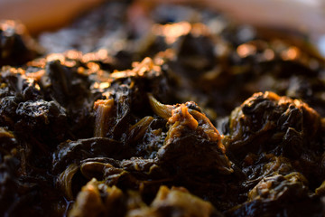Delicious Greek Dish With Spinach And Meat Stew At Sunset