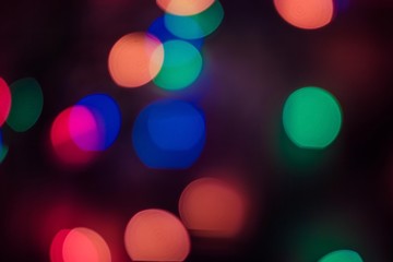 Blurred background with color circles.