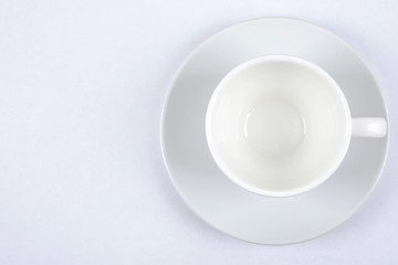 empty coffee Cup on saucer on white background