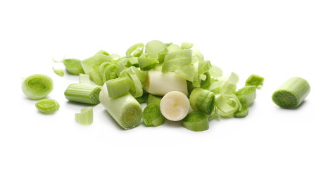 Fresh sliced leeks isolated on white background