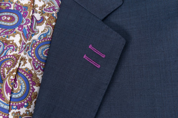 Detalle costura textil, chaqueta