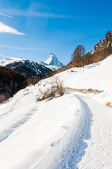 Fototapeta na wymiar Zermatt, Furi, Zmutt, Wanderweg, Winterwanderung, Winter, Matterhorn, Alpen, Wallis, Walliser Berge, Schweiz