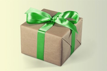 Gift box with green ribbon isolated