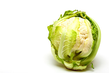Fototapeta premium Close up of a uncooked Cauliflower isolated on a white background with copy space