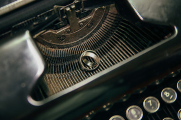 Wedding rings on the typewriter. Wedding rings placed on an ancient typewriter letter buttons. 