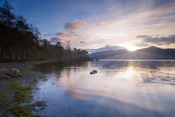 sunset at derwent water lake district england uk 