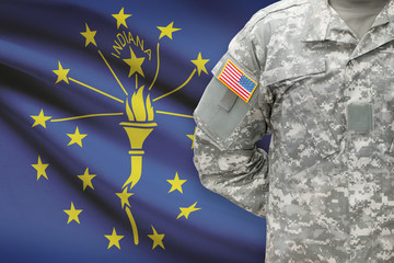American soldier with US state flag on background - Indiana