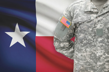 American soldier with flag on background - Texas