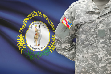 American soldier with US state flag on background - Kentucky